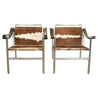 Pair Bauhaus Basculant LC1 Sling Armchairs Le Corbusier Cow Hide Cassina 1960s