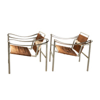 Pair Bauhaus Basculant LC1 Sling Armchairs Le Corbusier Cow Hide Cassina 1960s