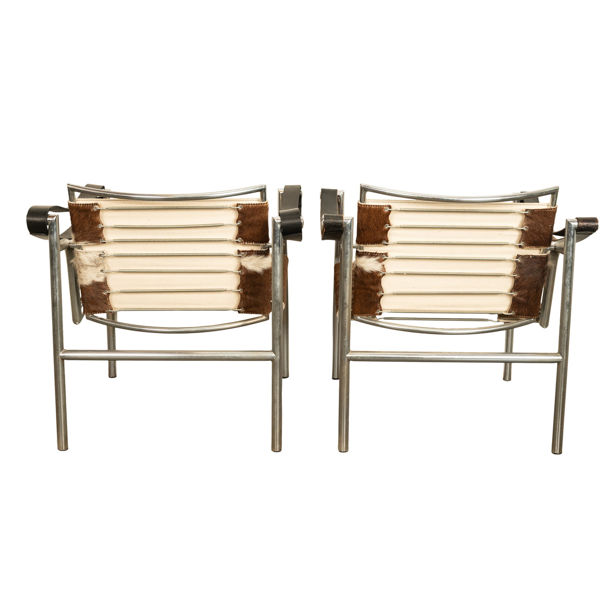 Pair Bauhaus Basculant LC1 Sling Armchairs Le Corbusier Cow Hide Cassina 1960s