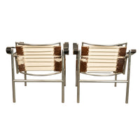 Pair Bauhaus Basculant LC1 Sling Armchairs Le Corbusier Cow Hide Cassina 1960s