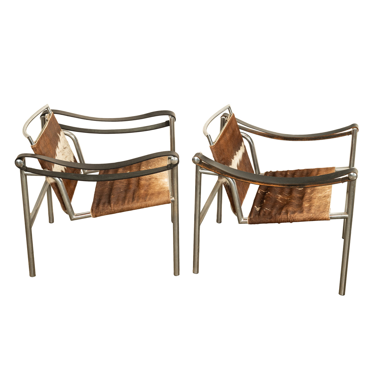 Pair Bauhaus Basculant LC1 Sling Armchairs Le Corbusier Cow Hide Cassina 1960s