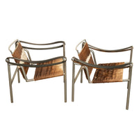Pair Bauhaus Basculant LC1 Sling Armchairs Le Corbusier Cow Hide Cassina 1960s