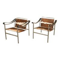 Pair Bauhaus Basculant LC1 Sling Armchairs Le Corbusier Cow Hide Cassina 1960s