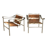 Pair Bauhaus Basculant LC1 Sling Armchairs Le Corbusier Cow Hide Cassina 1960s