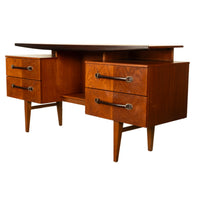 Vintage Danish Mid Century Modern Teak Four Drawer Desk with Floating Top 1965