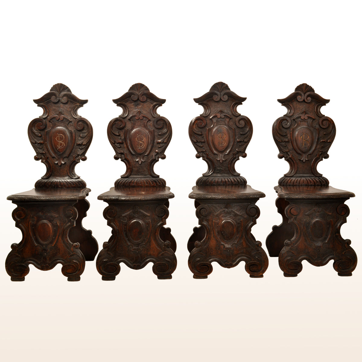 Set of Four Antique 18th Century Italian Carved Walnut Sgabello Hall Side Chairs, circa 1780