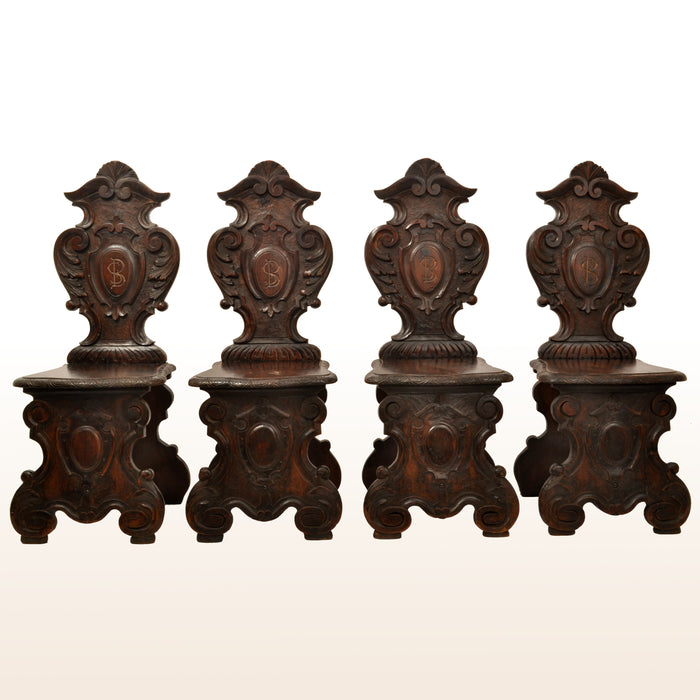 Set of Four Antique 18th Century Italian Carved Walnut Sgabello Hall Side Chairs, circa 1780