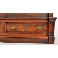 Antique American Renaissance Revival Eastlake Carved Walnut Tall Bookcase, circa 1875