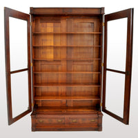 Antique American Renaissance Revival Eastlake Carved Walnut Tall Bookcase, circa 1875