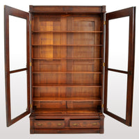 Antique American Renaissance Revival Eastlake Carved Walnut Tall Bookcase, circa 1875