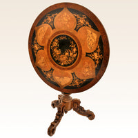 Antique Swiss Black Forest Walnut Tilt-Top Marquetry Carved Pedestal Table, circa 1880
