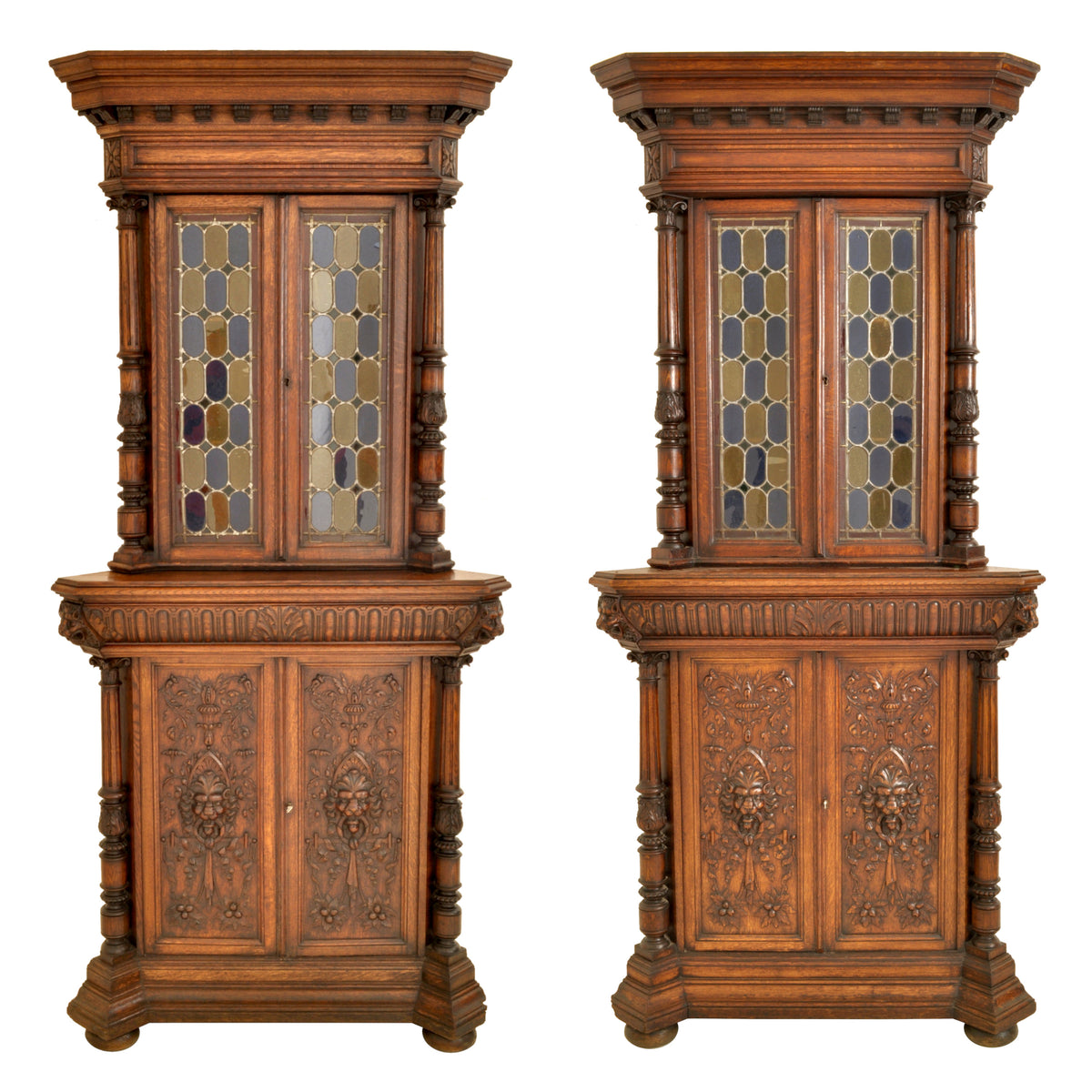 Pair of Antique French Renaissance Revival Carved Oak Stained Glass Corner Cabinets, circa 1880