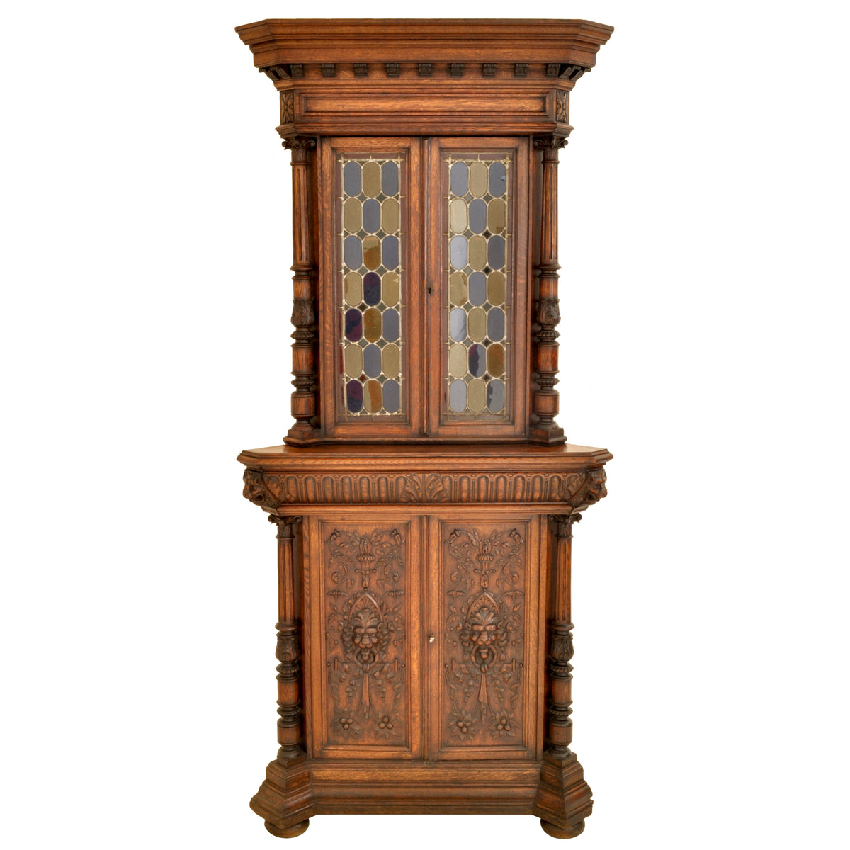 Pair of Antique French Renaissance Revival Carved Oak Stained Glass Corner Cabinets, circa 1880