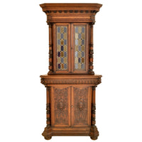 Pair of Antique French Renaissance Revival Carved Oak Stained Glass Corner Cabinets, circa 1880