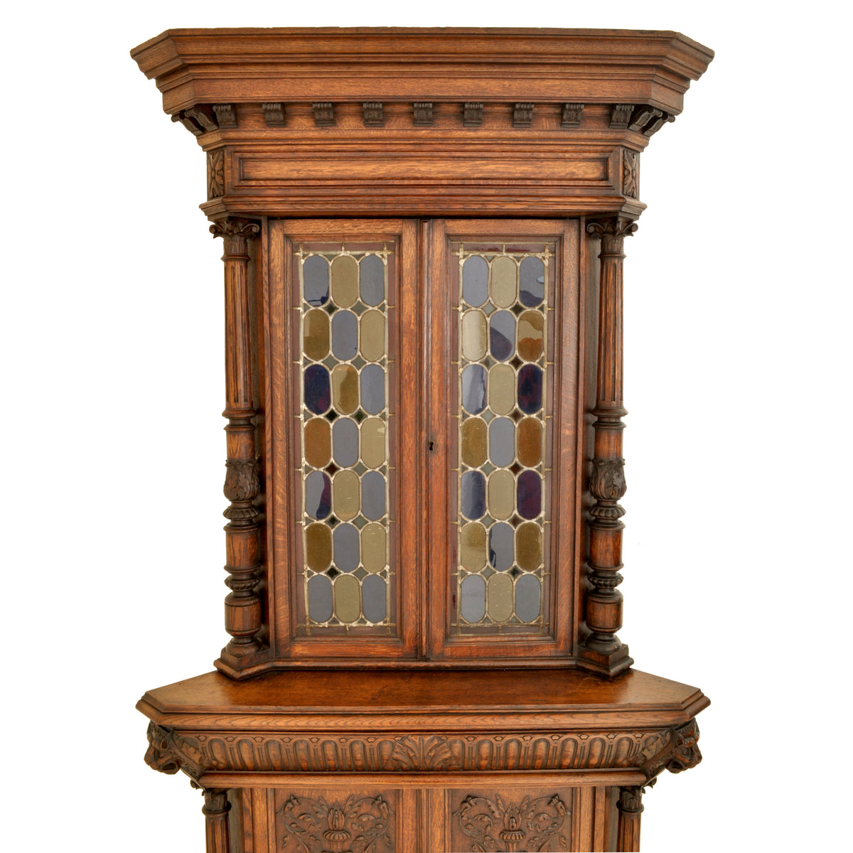 Pair of Antique French Renaissance Revival Carved Oak Stained Glass Corner Cabinets, circa 1880