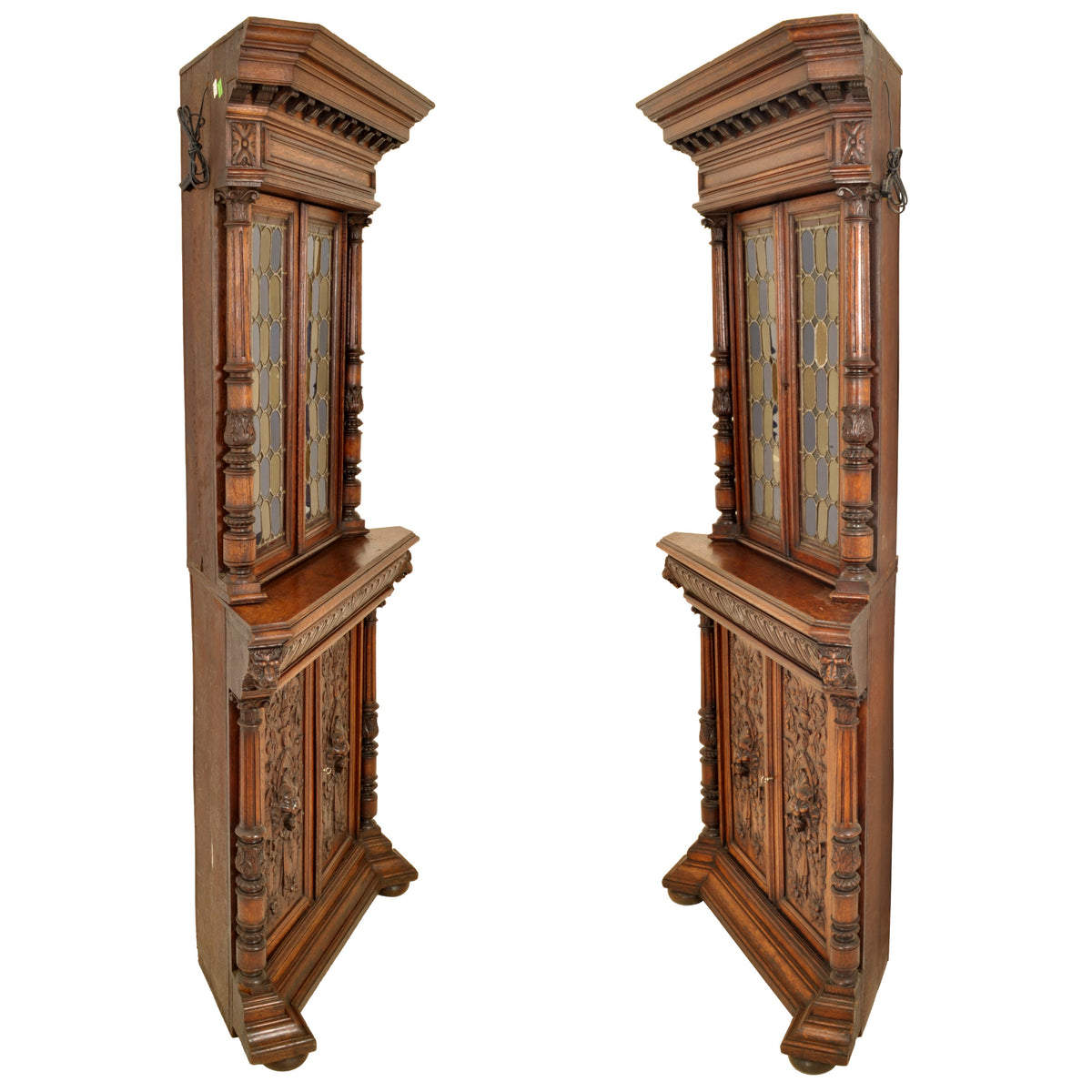 Pair of Antique French Renaissance Revival Carved Oak Stained Glass Corner Cabinets, circa 1880