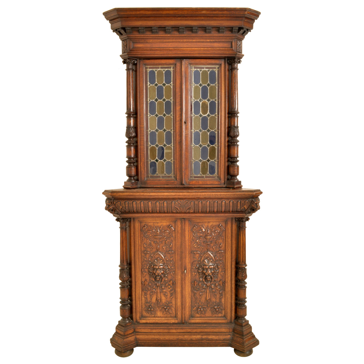 Pair of Antique French Renaissance Revival Carved Oak Stained Glass Corner Cabinets, circa 1880