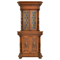 Pair of Antique French Renaissance Revival Carved Oak Stained Glass Corner Cabinets, circa 1880
