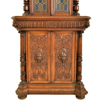 Pair of Antique French Renaissance Revival Carved Oak Stained Glass Corner Cabinets, circa 1880