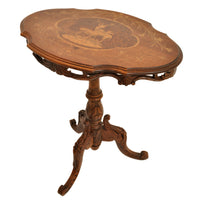 Antique Swiss Black Forest Carved Inlaid Walnut Marquetry Tilt-Top Table, circa 1870