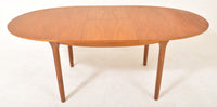 Mid-Century Modern Danish Teak Butterfly Leaf Dining Table by A.H. McIntosh & Co, 1960s