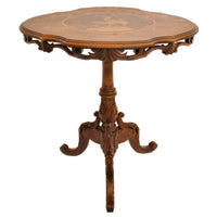 Antique Swiss Black Forest Carved Inlaid Walnut Marquetry Tilt-Top Table, circa 1870